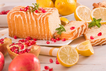 Lemon sponge cake with pomegranate.
