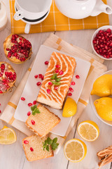 Lemon sponge cake with pomegranate.
