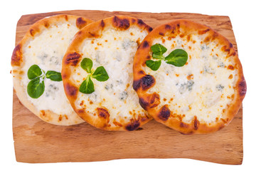 Delicious fresh pizza with cream on a wooden tray, board, dish. The object is isolated on a white background. Horizontal photo