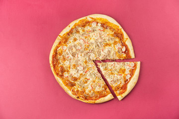pizza close-up, isolated, against a colored background. whole pizza 