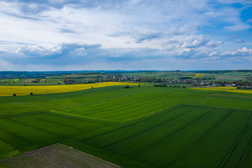 Obraz premium Aerial view of green agriculture field in Jura region, Silesian Voivodeship. Poland.