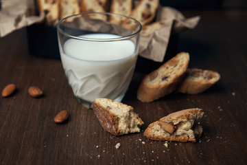 Homemade Italian cookies cantuccini with almond seeds in metal box on brown crumpled paper