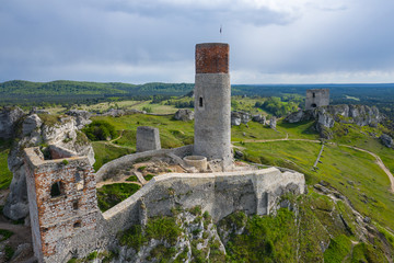 Fototapeta na wymiar Aerial view of Castle Hill in Olsztyn. Medieval fortress ruins in the Jura region near Czestochowa. Silesian Voivodeship. Poland. Central Europe.