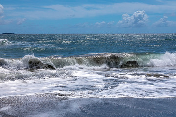 waves gently breaking on the beach