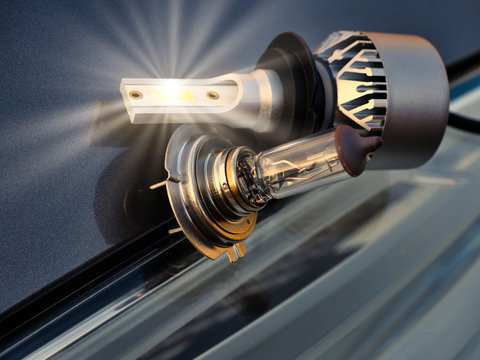  Halogen lamp and LED lamp for car headlights on the background of the headlight and body. Transition to new technology in road lighting.
