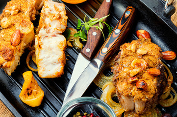 Fried piece fish in grill pan