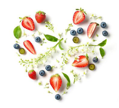 heart shaped composition of flowers and berries