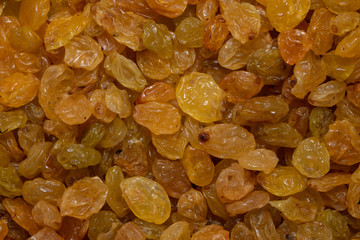 Raisins as an abstract background texture close up