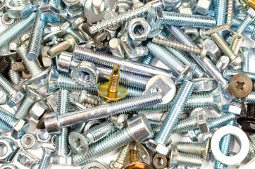 lots of metal bolts for construction and repair as a background