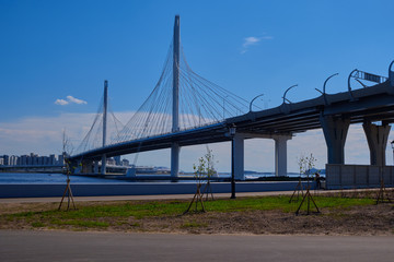 Fototapeta na wymiar Cable-stayed bridge across the ship fairway in St. Petersburg. Estuary of the river Big Neva.
