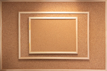 cork board in wooden frame as background