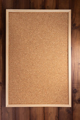 cork board on wooden background