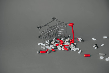 a fallen basket in a pile of pills. black and white photo
