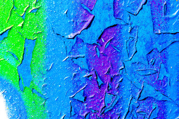 Fragment of colorful graffiti painted on a concrete wall. Bright yellow and blue abstract...