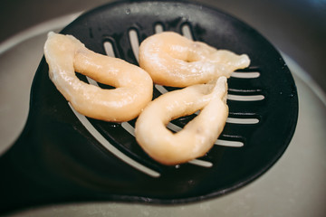 Hand-made taralli salty snack, typical from Puglia, Italy