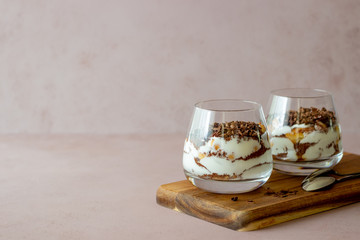 Italian dessert tiramisu in a glass. National cuisine. Traditional recipe.