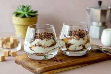 Italian dessert tiramisu in a glass. National cuisine. Traditional recipe.