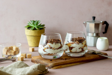 Italian dessert tiramisu in a glass. National cuisine. Traditional recipe.