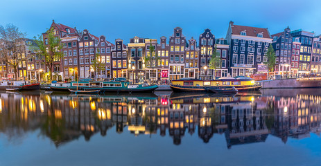 Panoramic view of Amsterdam city. Famous Dutch channels and great cityscape.