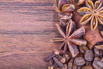 dark composition with star anise on wood background