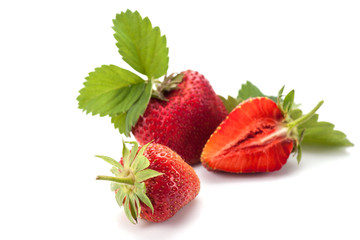 Strawberries with leaves. Isolated on a white background.