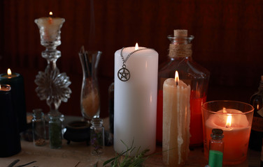 magic ritual with runes and pentagram and magical attributes