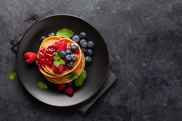 Delicious homemade pancakes with summer berries