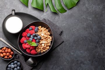 Healthy breakfast with granola, yogurt and berries
