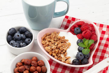 Healthy breakfast with granola, yogurt and berries
