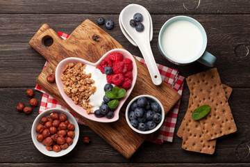 Healthy breakfast with granola, yogurt and berries