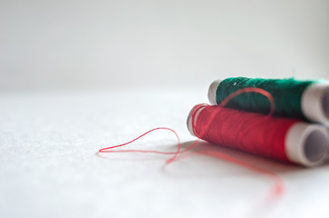 Colored threads on a white background