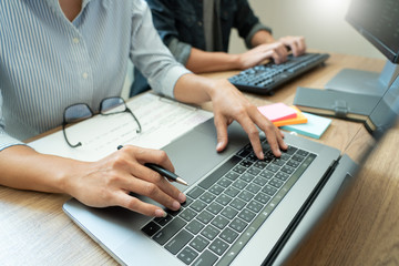 Collaborative work Software engineers website developer technologies or programmer working coding on startup ai application project on screen with partner in coworking space office company.