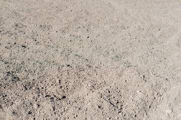 Preparing a ground with mesh to prevent weeds from growing and installing drip irrigation