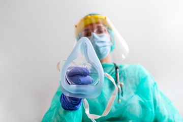 Doctor Woman holds Oxygen Mask for Inhale breath problem Patient, Coronavirus or Covid-19 attack...