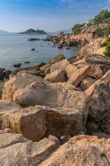 Fototapeta na wymiar Beautiful beach with stones in Vietnam.