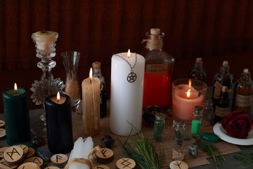magic ritual with runes and pentagram and magical attributes