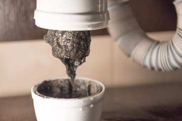Opened the trap, which was clogged. There is a lot of dirt and black algae in the siphon. The...