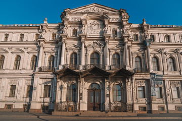 Fototapeta na wymiar Beautiful historical facades of buildings in Saint Petersburg, magnificent architecture, sculptures and columns, marble