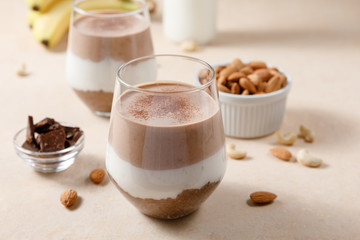 Chia seeds pudding with chocolate and banana smoothie in a glass