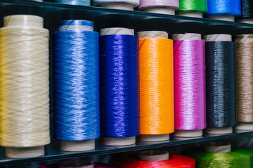 Big colored rolll clew of synthetic thread for carpet