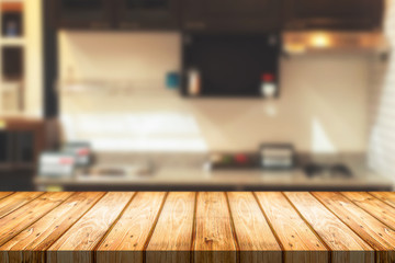 Wood desk space and blurred of kitchen background. for product display montage. business presentation.