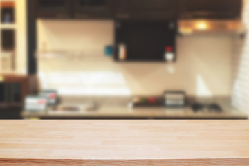 Wood desk space and blurred of kitchen background. for product display montage. business presentation.
