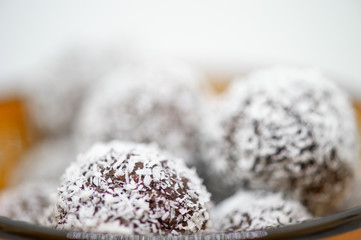 Close up of coconut balls in a bowl