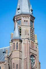 Obraz premium Detailed view of part of a Catholic Church in Gothic Revival style. Saint Peter and Paul church in the village of Reeuwijk-dorp, Netherlands.