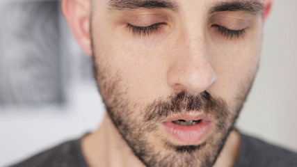 Obraz premium Close-up portrait of caucasian man that meditates