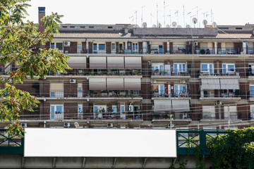 Fototapeta premium Large blank billboard on the street in the city, mock up - Image
