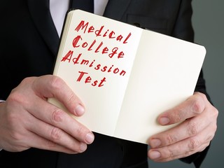 Business concept about Medical College Admission Test with phrase on the page.