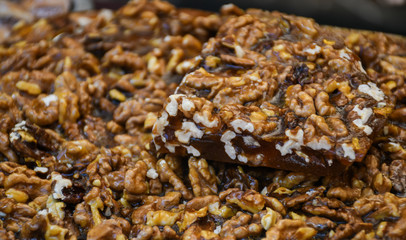 Granola bar in a bowl for sale. Healthy sweet dessert snack. Cereal granola bar with nuts, fr
