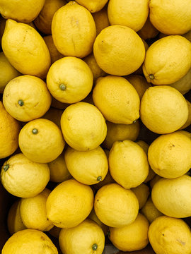 lots of ripe yellow lemon for cooking background