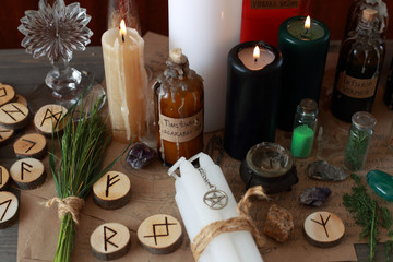 Fototapeta na wymiar magic ritual with runes and pentagram and magical attributes